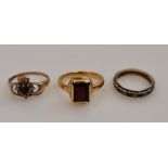 A hallmarked 9ct yellow gold gem set Claddagh ring, weight approx. 2g, a red paste signet ring,