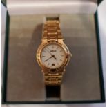 A boxed gold plated ladies Gucci 9200L wrist watch, with warranty card, paperwork and spare bracelet