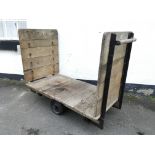 A Slingsby Truck sliding wheel wooden base platform trolley. IMPORTANT: Online viewing and bidding