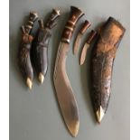Early 20th century kukri with two Indian replicas. IMPORTANT: Online viewing and bidding only.