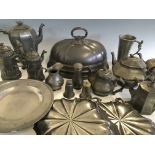 Selection of pewter ware to include tureen lid, plates, coffee pots, jugs, salt and pepper