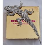 A Butler & Wilson lizard/ gecko brooch, measuring approx. 18x8cm, in box. IMPORTANT: Online