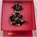 A Butler & Wilson cat brooch, measuring approx. 9x7cm, in box. IMPORTANT: Online viewing and bidding