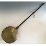 Brass with iron handle warming pan inscribed ‘wait on the Lord 1670’ with feathers to centre.