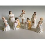 Seven Royal Doulton figurines, Buddies (x2), My First Pet (x2), First Performance, Birthday Girl and