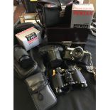 Camera equipment to include Tesco binoculars, Pentax ME Super camera, Kirin macro lens, etc.