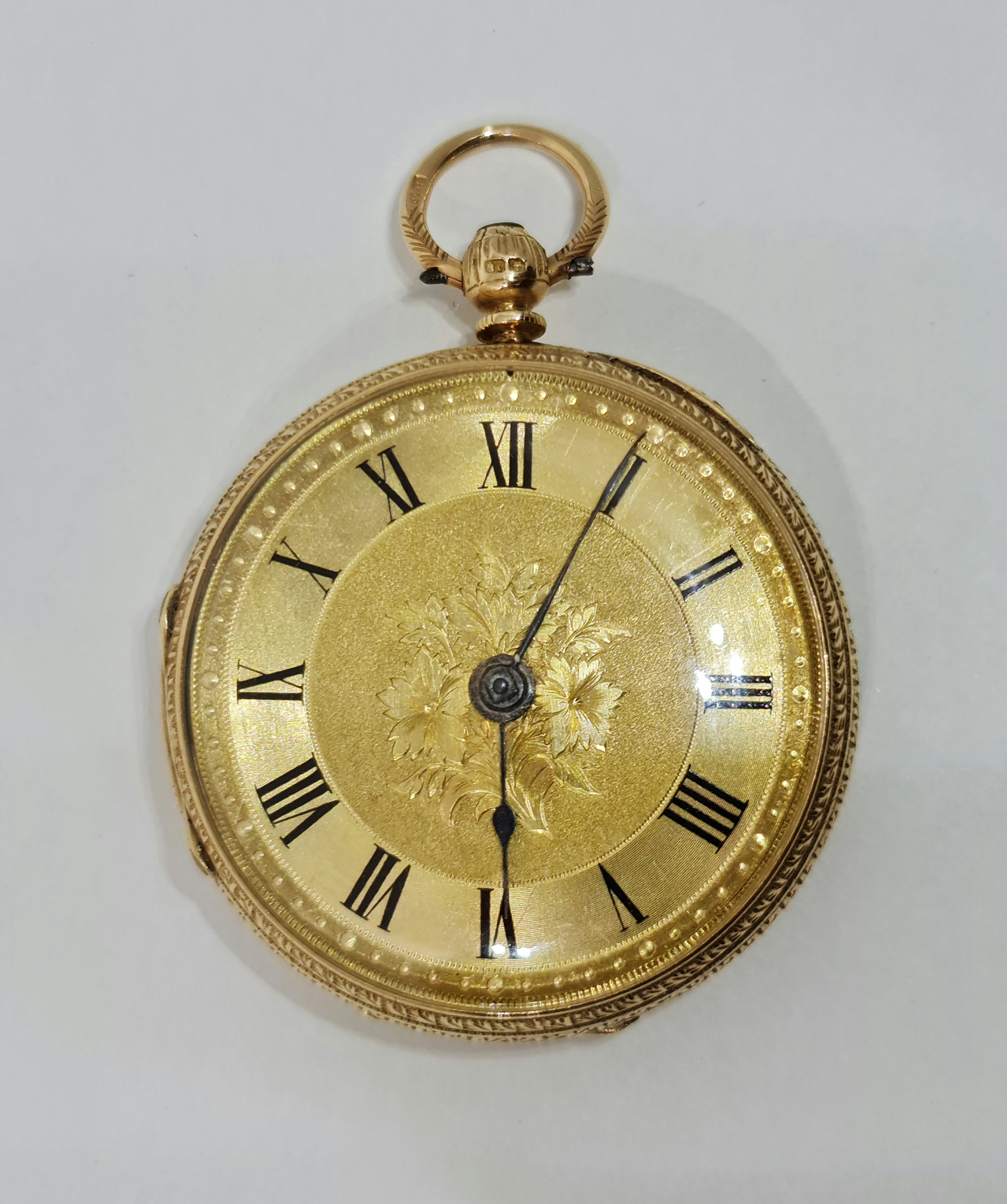 An 18ct yellow gold fob watch, the gold-tone dial having hourly Roman numeral markers with minute