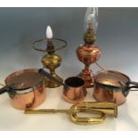 Selection of brass and copper ware to include two lidded pans with smaller pan, coach horn, two