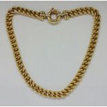 A curb link chain necklace, stamped 750, length approx. 45cm, weight approx. 48.3g. IMPORTANT: