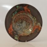 A Roger Cockram studio pottery bowl decorated with prawns and jellyfish monogram to base. 26.5cm.