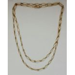 An oval link chain, stamped 375, length approx. 92cm, weight approx. 17.5g. IMPORTANT: Online