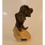 Sculpture of windswept female on stone base, with plaque inscribed ‘Carols Disseny’, height 28cm.