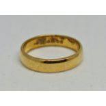 A hallmarked 22ct yellow gold plain wedding band, ring size M, weight approx. 5.3g. IMPORTANT: