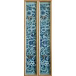 A pair of framed silk embroidered blue kimono sleeve panels, butterfly and leaf design in blue white