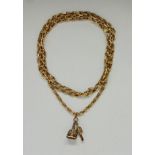 A hallmarked 9ct yellow gold belcher link chain, length approx. 98cm, with attached engraved citrine