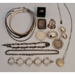 A collection of jewellery, to include collar necklaces, brooch and earrings, a mounted dollar