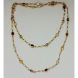 A multi-gemstone necklace, the belcher link chain set with various oval cut gemstones, to include