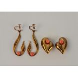 Two pairs of coral bead earrings, one of curved design stamped 9ct, the other of heart design