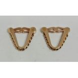 A pair of hallmarked 18ct rose gold cufflinks, the triangular design with rope twist feature,