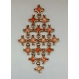 A coral pendant, set with coral spheres in diamond shape open metalwork design, stamped 375,