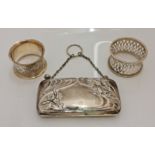 A hallmarked silver purse on chain, of Art Nouveau flower design, approx. weight 74.8gms, together