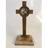 Miniature crucifix on onyx base with picture of the Virgin and Christ to centre, height 16cm.