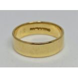 A hallmarked 18ct yellow gold plain wedding band, ring size V½, weight approx. 7.6g. IMPORTANT: