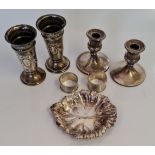 A pair of hallmarked silver trumpet embossed vases with ribbon design, approx. height 12cms, a