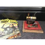 A Mamod model steam engine, with two boxes of childrens magazines. IMPORTANT: Online viewing and