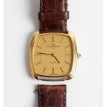 A gents Baume & Mercier quartz wrist watch, the gold-tone dial having hourly baton markers,