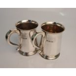 Two Harrods silver tankards, both with initials T.D.G., both hallmarked London 1936 and 1937, with