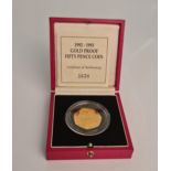 A 1992-1993 Gold Proof Fifty Pence Coin in box, N0. 1638 IMPORTANT: Online viewing and bidding only.