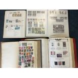 Five albums of world stamps, including The All American stamp album containing a selection of