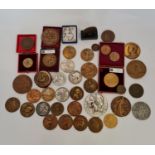 Approximately 41 various plaques and medals to include Fireman medal, Georges Contaux, H.Demy,