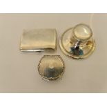 A selection of hallmarked silver to include an ink well, cigarette case, trinket box, approx.