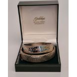 Two hallmarked silver hinged bangles, total lot weight approx. 67g. IMPORTANT: Online viewing and