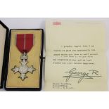 A military M.B.E medal awarded to Major Geoffrey E. M. Godfrey R.E.M.E, with letter from