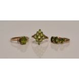 A hallmarked 9ct yellow gold peridot ring with pearls either side, ring size O½, a hallmarked 9ct