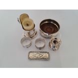 A selection of silver to include wine coaster, napkin rings, candle holders, lid, approx. total