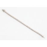 A diamond tennis bracelet, set with 38 round brilliant cut diamonds, each measuring approx. 0.