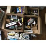 Six boxes of various model vehicles including Dinky, Burago, Vanguards, Eddie Stobart, etc, some