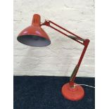 A Thousand & One Ltd London red Anglepoise lamp. IMPORTANT: Online viewing and bidding only.