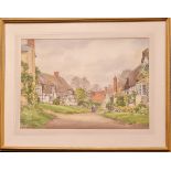 FRANK EGGINGTON. Framed, signed watercolour on paper, figures on street surrounded by cottages, 37cm