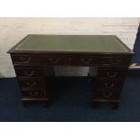 A mahogany reproduction twin pedestal desk. IMPORTANT: Online viewing and bidding only. Collection
