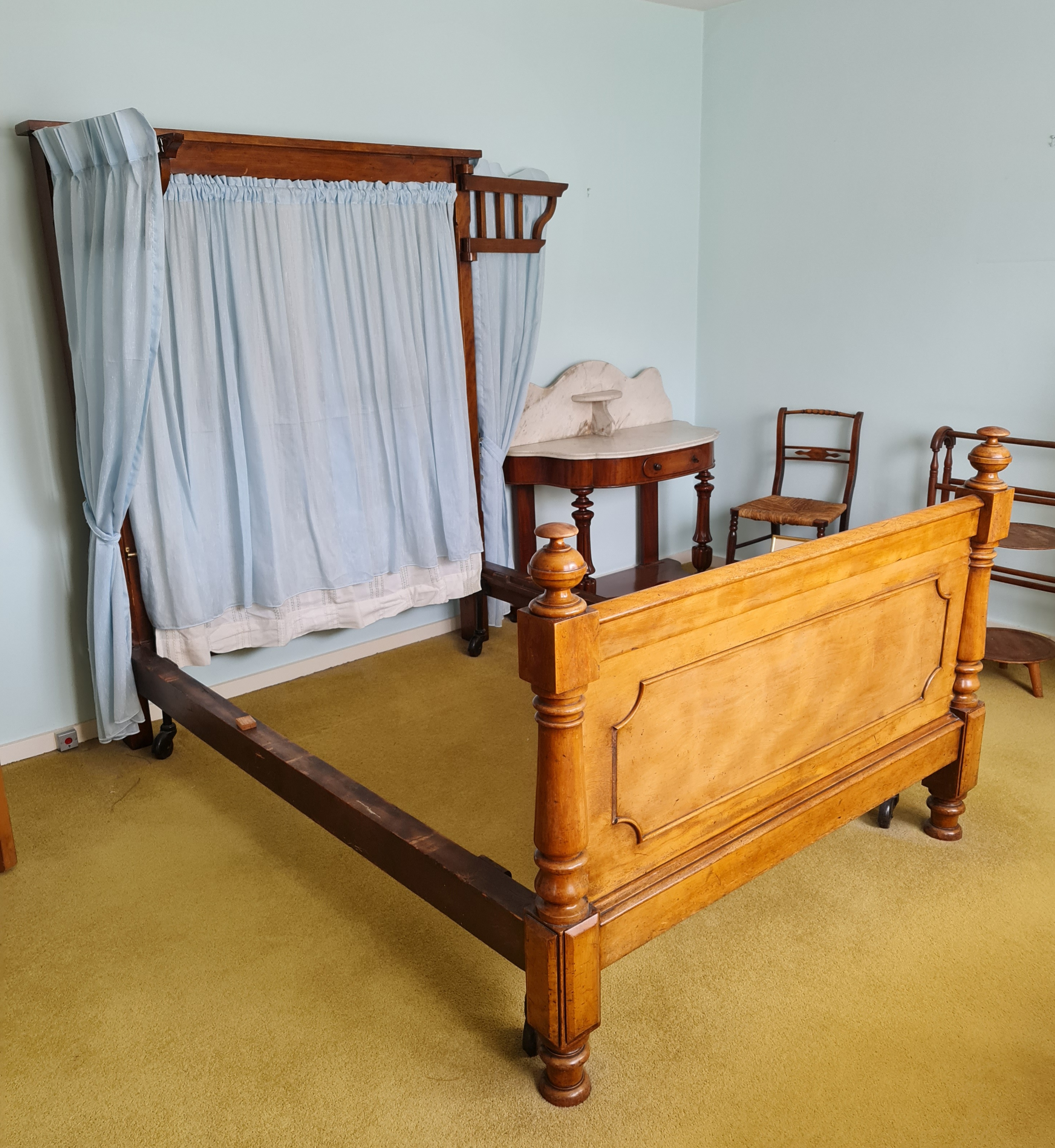 A Victorian mahogany half tester four foot bed frame. IMPORTANT: Online viewing and bidding only.