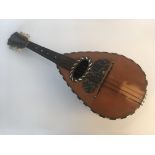 A mandolin labelled 'F. De Mureda, Fabricante di Strumenti Armonici, Napoli, Anno 189', with inlay