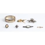 A collection of costume jewellery, to include three brooches, a seed pearl swallow design lace pin