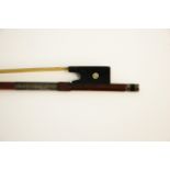 A Gand & Bernardel violin bow, stamped to end, with pearl details to ebony frog, approx. length