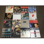 Eighteen Rolling Stones vinyl records (thirteen 12 inch singles), Going To a Go Go (x2), Time Is