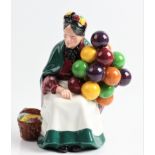 A Royal Doulton The Old Balloon Seller figure. IMPORTANT: Online viewing and bidding only.